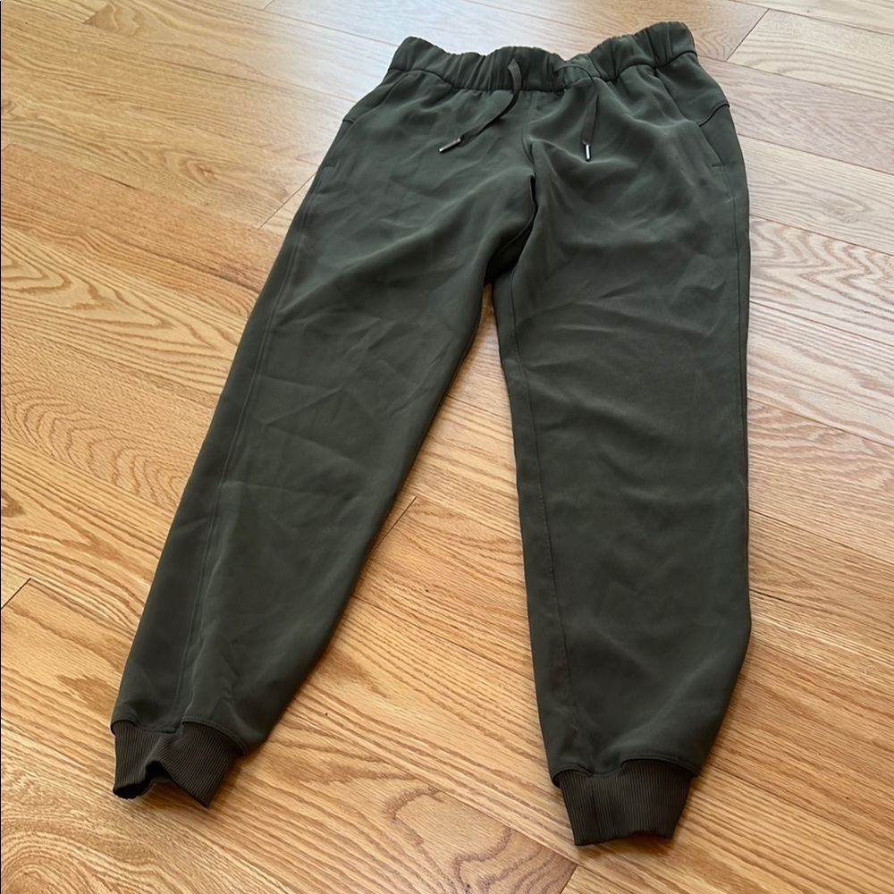 Lululemon SZ 2 on the fly jogger pants in dark olive green.